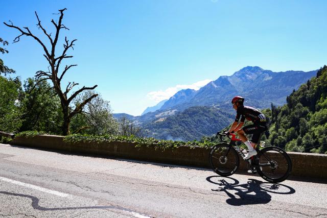 Tudor Pro Cycling Team's Swiss rider Robin Donze cycles in the ascent of Cote d'Hery-sur-Ugine during the 6th stage of the Tour Auvergne-Rhone-Alpes cycling race (formerly known as the Criterium du Dauphine), 182,3km between Saint-Vulbas and Crest-Voland in the French Alps on June 12, 2026. (Photo by Anne-Christine POUJOULAT / AFP)