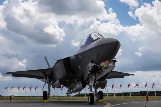 US-made F-35 aircraft (Polish codename Husarz) of the Polish Air Force is seen parked on the tarmac at the 32nd Tactical Air Base in Lask, central Poland, on June 12, 2026, on the day of their official entry into service with the Polish Air Force. (Photo by Wojtek RADWANSKI / AFP)