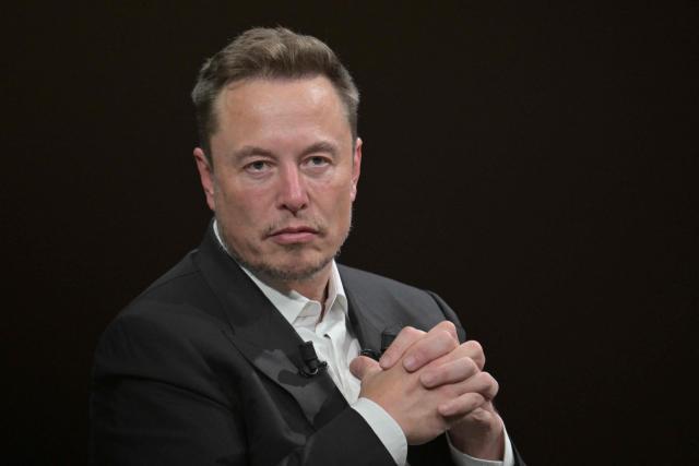 (FILES) SpaceX, Twitter and electric car maker Tesla CEO Elon Musk looks on as he speaks during his visit at the Vivatech technology startups and innovation fair at the Porte de Versailles exhibition center in Paris, on June 16, 2023. Elon Musk's SpaceX began its first day as a public company on Wall Street on June 12, 2026, after the biggest initial public offering in history, with the polarizing entrepreneur promising he will take humanity to Mars. The blockbuster operation, which raised more than $75 billion, is expected to make Musk the world's first trillionaire and kick off a series of major IPOs by AI companies in the coming months. (Photo by Alain JOCARD / AFP)
