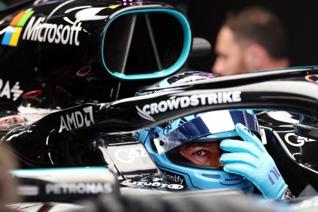 Mercedes' British driver George Russell prepares hilself for the second practice session at the Circuit de Catalunya ahead of the Catalonia Formula One Grand Prix in Montmelo, on the outskirts of Barcelona on June 12, 2026. (Photo by Lluis GENE / AFP)