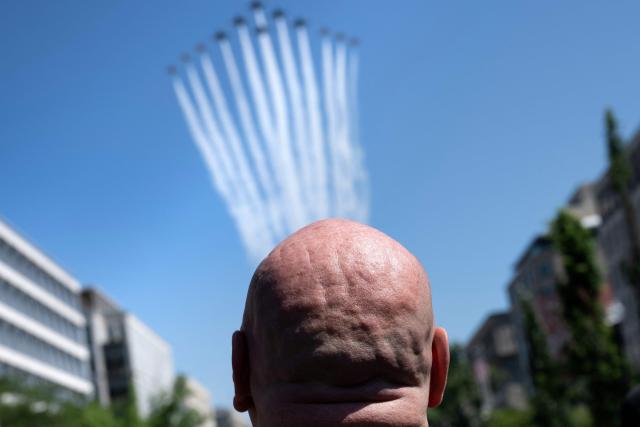 Dana White, President and CEO of Ultimate Fighting Championship (UFC), watches as US military jets practice a flyover ahead of the UFC Freedom 250 event at the White House in Washington, DC on June 12, 2026. The UFC Freedom 250 event will be held on the South Lawn of the White House on US President Donald Trump's 80th birthday on June 14. (Photo by Brendan Smialowski / AFP)