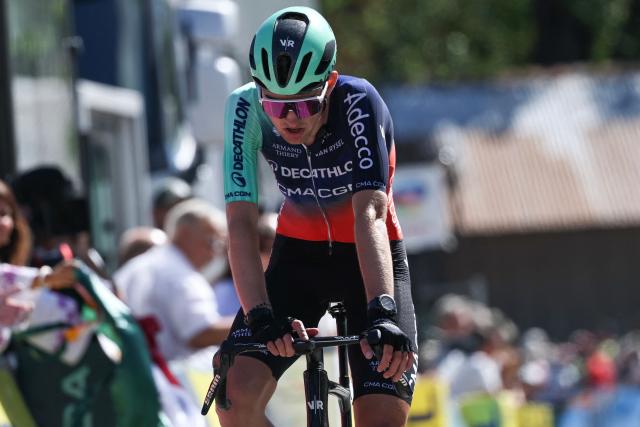 Decathlon CMA CGM Team's French rider Paul Seixas cycles across the finish line of the 6th stage of the Tour Auvergne-Rhone-Alpes cycling race (formerly known as the Criterium du Dauphine), 182,3km between Saint-Vulbas and Crest-Voland in the French Alps on June 12, 2026. (Photo by Anne-Christine POUJOULAT / AFP)