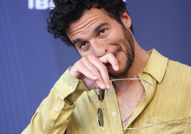 French-Israeli singer and music composer Amir arrives for the opening ceremony of the 65th Monte-Carlo Television Festival in Monaco on June 12, 2026. (Photo by Valery HACHE / AFP)