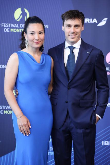 Son of Stephanie of Monaco Louis Ducruet (R) and his wife Marie Chevallier arrive for the opening ceremony of the 65th Monte-Carlo Television Festival in Monaco on June 12, 2026. (Photo by Valery HACHE / AFP)