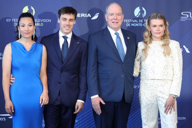 Son of Stephanie of Monaco Louis Ducruet (2L), his wife Marie Chevallier (L), Prince Albert II of Monaco (2R) and daughter of Stephanie of Monaco Camille Gottlieb arrive for the opening ceremony of the 65th Monte-Carlo Television Festival in Monaco on June 12, 2026. (Photo by Valery HACHE / AFP) / / NO TABLOIDS WEB & PRINT, NO DAILY MAIL, NO DAILY MAIL GROUP, NO VOICI, NO CLOSER