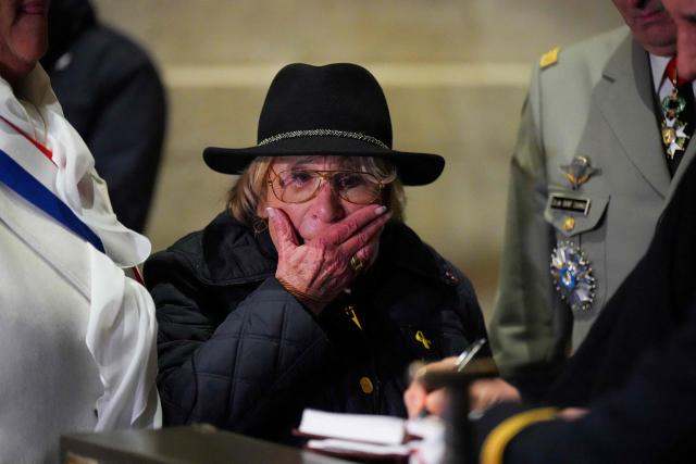 (FILES) French holocaust survivor and President of the Auschwitz Deportees' Union Arlette Testyler reacts as she takes part in the Rekindling the Flame ceremony at the Tomb of the Unknow Soldier during commemorations on the 80th anniversary of the liberation of the German Nazi concentration and extermination camp Auschwitz-Birkenau by the Red Army, marking the International Holocaust Remembrance Day, at the Arc de Triomphe in Paris, on January 27, 2025. The president of the Union of Auschwitz Deportees, Arlette Testyler, a survivor of the Vel d’Hiv round-up, died on June 12, 2026, at the age of 93, the Foundation for the Memory of the Shoah has announced. Born in Paris in 1933, Arlette Testyler, whose father died in Auschwitz, was arrested with her mother Malka and her sister Madeleine on July 16, 1942, then taken to the Velodrome d’Hiver before being interned at the Beaune-la-Rolande transit camp, from which they managed to escape, the Foundation recalls. (Photo by Dimitar DILKOFF / AFP)