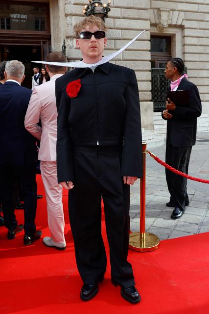 French singer and actor Eddy De Pretto poses ahead of the Fier Gala, a festive and charitable event to support LGBTQ+ rights, at the National Theatre of the Opera Comique in Paris on June 12, 2026. (Photo by Kenzo TRIBOUILLARD / AFP)