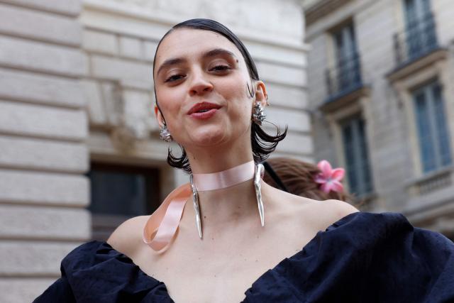 French singer Pomme poses ahead of the Fier Gala, a festive and charitable event to support LGBTQ+ rights, at the National Theatre of the Opera Comique in Paris on June 12, 2026. (Photo by Kenzo TRIBOUILLARD / AFP)