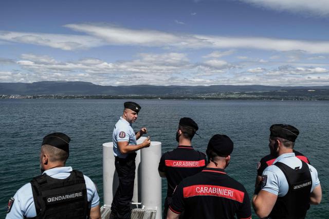 Members of the French Gendarmerie and Italian Carabinieri patrol together in the streets of Yvoire, on June 12, 2026 during a new Franco-Italian Operational Unit (UOFI) prior to the G7 Summit in Evian. (Photo by Jeff PACHOUD / AFP)