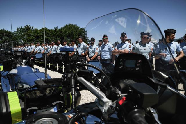 Members of the French gendarmerie motorcycle unit attend a general briefing as they prepare ahead of the  G7 Summit in Evian, on June 12, 2026 in La-Roche-sur-Foron. (Photo by Jeff PACHOUD / AFP)