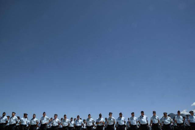 Members of the French gendarmerie motorcycle unit attend a general briefing as they prepare ahead of the  G7 Summit in Evian, on June 12, 2026 in La-Roche-sur-Foron. (Photo by Jeff PACHOUD / AFP)
