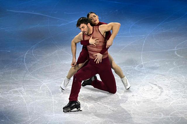 (FILES) France's Guillaume Cizeron and France's Laurence Fournier Beaudry perform at the figure skating exhibition gala during the Milano Cortina 2026 Winter Olympic Games at Milano Ice Skating Arena in Milan on February 21, 2026. Guillaume Cizeron and Laurence Fournier Beaudry, Olympic ice dance champions in Milan four months ago, announced on June 12, 2026, that they were continuing their partnership with the aim of competing at the 2030 Winter Olympics in the French Alps. (Photo by Gabriel BOUYS / AFP)