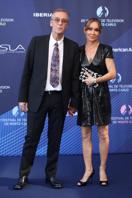 British actor John Hannah and his spouse Danish-British actress Joanna Roth arrive for the opening ceremony of the 65th Monte-Carlo Television Festival in Monaco on June 12, 2026. (Photo by Valery HACHE / AFP)