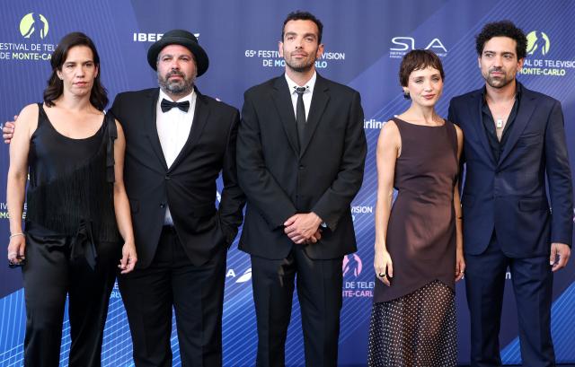 Portuguese actress Raquel Rocha Vieira (L), Portuguese director Bruno Gascon (2L), Portuguese actress Paula De Magalhaes (2R) and Portuguese actor Rafael Morais (R) arrive for the opening ceremony of the 65th Monte-Carlo Television Festival in Monaco on June 12, 2026. (Photo by Valery HACHE / AFP)
