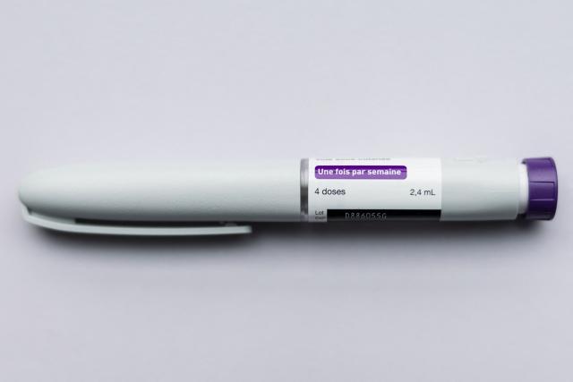 This photograph shows a KwikPen of the drug Mounjaro, containing the active ingredient tirzepatide, used in the treatment of obesity, at the Valenciennes Hospital Centre (Centre Hospitalier de Valenciennes) in Valenciennes, northern France on June 12, 2026. (Photo by Sameer Al-DOUMY / AFP)