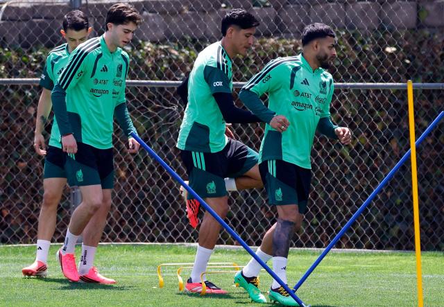 (FromR) Mexico's forward #10 Alexis Vega, Mexico's defender #03 Cesar Montes and Mexico's midfielder #26 Brian Gutierrez take part in a training session for the FIFA 2026 World Cup at Centro de Alto Rendimiento (CAR) in Mexico City on June 12, 2026. (Photo by Rodrigo Oropeza / AFP)