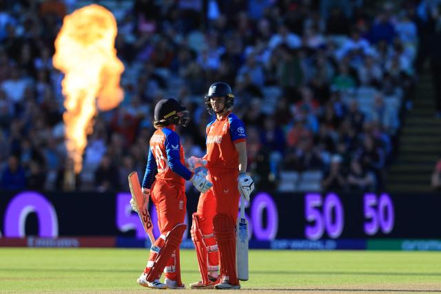 England's Amy Jones (R) celebrates her half-century on the first day of the ICC Women's T20 cricket World Cup 2026 Group 2 stage cricket match between England and Sri Lanka at Edgbaston cricket ground in Birmingham, central England on June 12, 2026. (Photo by Darren Staples / AFP)