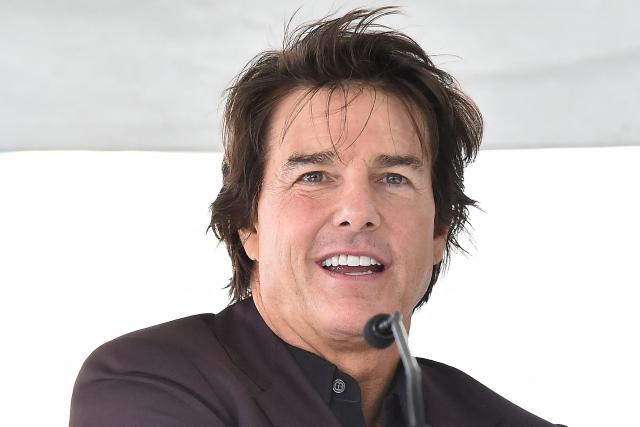 US actor Tom Cruise speaks during the Hollywood Walk of Fame star ceremony for English former footballer David Beckham in Hollywood, California, on June 12, 2026. (Photo by LISA O'CONNOR / AFP)