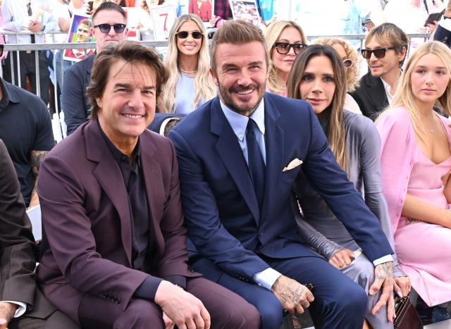 English former footballer David Beckham (C), his wife Victoria Beckham (2nd R), their daughter Harper Beckham and US actor Tom Cruise attend Beckham's Hollywood Walk of Fame star ceremony in Hollywood, California, on June 12, 2026. (Photo by LISA O'CONNOR / AFP)