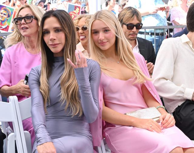 British fashion designer Victoria Beckham and daughter Harper Beckham attend English former footballer David Beckham's Hollywood Walk of Fame star ceremony in Hollywood, California, on June 12, 2026. (Photo by LISA O'CONNOR / AFP)