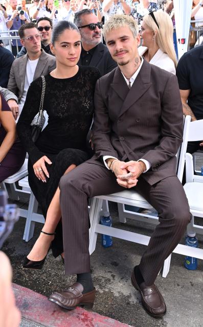 Romeo Beckham and girlfriend Gray Sorrenti attend his father English former footballer David Beckham's Hollywood Walk of Fame star ceremony in Hollywood, California, on June 12, 2026. (Photo by LISA O'CONNOR / AFP)