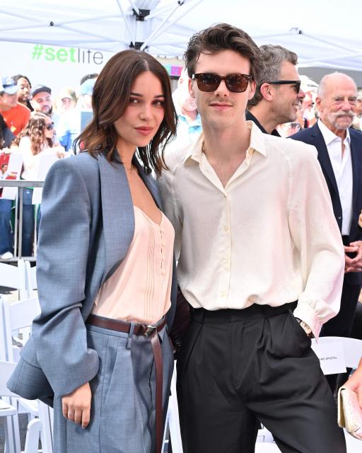 Cruz Beckham and girlfriend Jackie Apostel attend his father English former footballer David Beckham's Hollywood Walk of Fame star ceremony in Hollywood, California, on June 12, 2026. (Photo by LISA O'CONNOR / AFP)