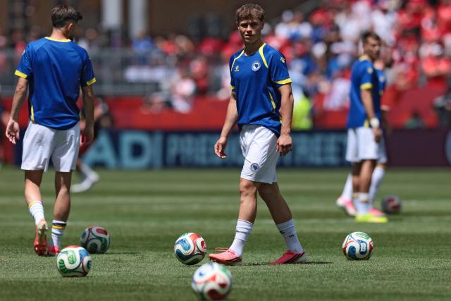 Bosnia-Herzegovina's midfielder #26 Ermin Mahmic takes part in the warm-up ahead of the 2026 World Cup Group B football match between Canada and Bosnia and Herzegovina at the Toronto Stadium in Toronto on June 12, 2026. (Photo by Cole Burston / AFP)