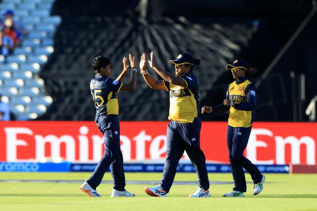 Sri Lanka's captain Chamari Athapaththu celebrates taking the wicket of England's Amy Jones on the first day of the ICC Women's T20 cricket World Cup 2026 Group 2 stage cricket match between England and Sri Lanka at Edgbaston cricket ground in Birmingham, central England on June 12, 2026. (Photo by Darren Staples / AFP)