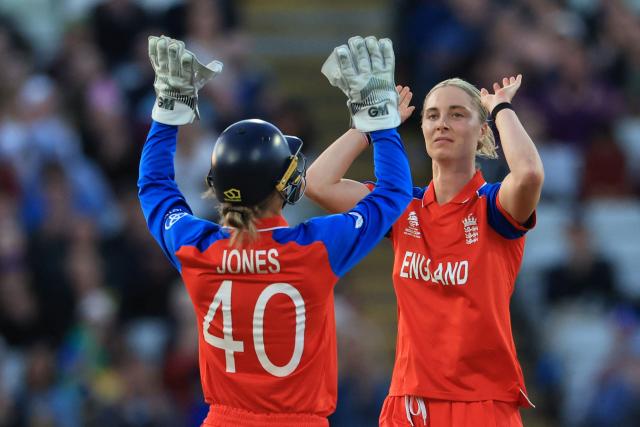 England's Freya Kemp (R) celebrates taking the wicket of Sri Lanka's Harshitha Samarawickrama on the first day of the ICC Women's T20 cricket World Cup 2026 Group 2 stage cricket match between England and Sri Lanka at Edgbaston cricket ground in Birmingham, central England on June 12, 2026. (Photo by Darren Staples / AFP)