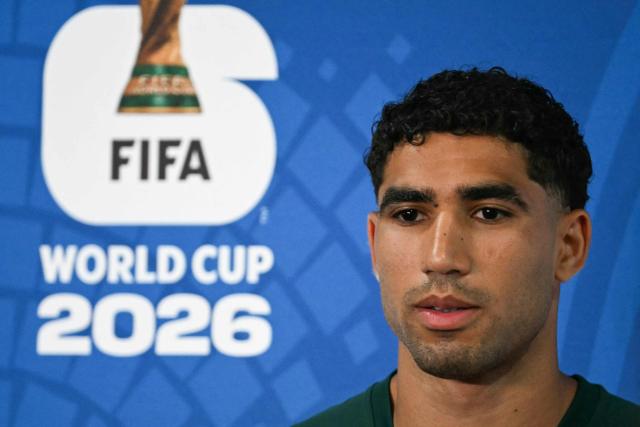Morocco's defender #02 Achraf Hakimi gestures during a press conference at the New York/New Jersey Stadium in East Rutherford on June 12, 2026, on the eve of the 2026 World Cup football match between Brazil and Morocco. (Photo by Mauro PIMENTEL / AFP)
