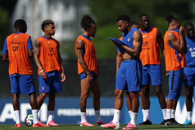 France's forward #10 Kylian Mbappe (C) takes part in a training session at Bentley University, the team's base camp, during the 2026 World Cup football tournament in Waltham, near Boston, on June 12, 2026. (Photo by FRANCK FIFE / AFP)