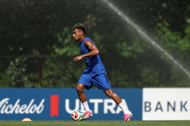 France's forward #20 Desire Doue takes part in a  training session at Bentley University, the team's base camp, during the 2026 World Cup football tournament in Waltham, near Boston, on June 12, 2026. (Photo by FRANCK FIFE / AFP)