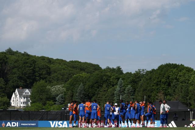 France's players gather at a training session at Bentley University, the team's base camp, during the 2026 World Cup football tournament in Waltham, near Boston, on June 12, 2026. (Photo by FRANCK FIFE / AFP)