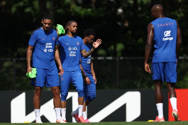 France's forward #12 Bradley Barcola (C) takes part in a  training session at Bentley University, the team's base camp, during the 2026 World Cup football tournament in Waltham, near Boston, on June 12, 2026. (Photo by FRANCK FIFE / AFP)