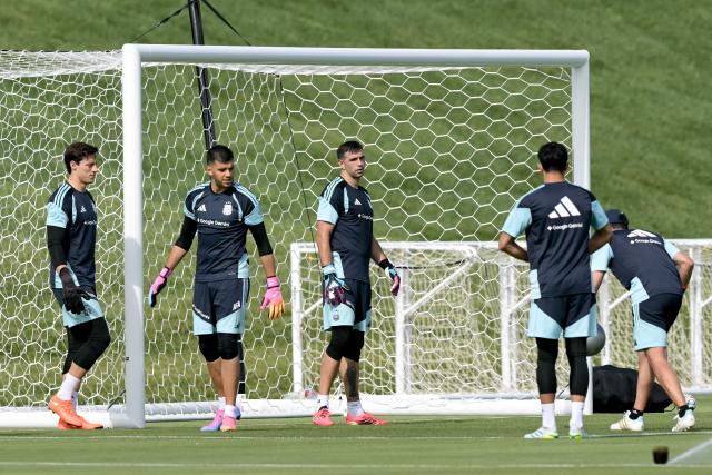 (L-R) Argentina's goalkeepers Santiago Beltran, Geronimo Rulli, and Emiliano Martinez take part in a training session for the 2026 FIFA World Cup football tournament at Sporting KC Training Centre in Kansas City on June 12, 2026. (Photo by JUAN MABROMATA / AFP)