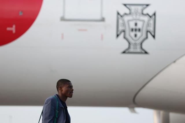 Portugal's defender #25 Nuno Mendes walks on the runway upon his arrival at the Palm Beach International Airport for the FIFA 2026 World Cup football tournament, in West Palm Beach, Florida on June 12, 2026. (Photo by PATRICIA DE MELO MOREIRA / AFP)