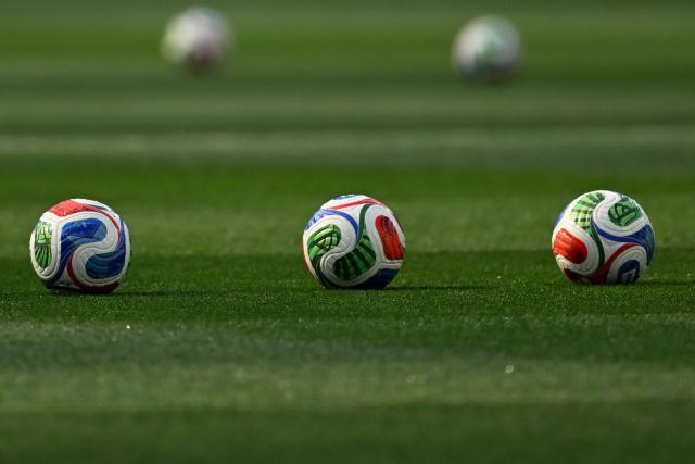 Trionda balls are pictured on the pitch ahead of the 2026 World Cup Group D football match between USA and Paraguay at the Los Angeles Stadium in Inglewood on June 12, 2026. (Photo by Patrick T. Fallon / AFP)