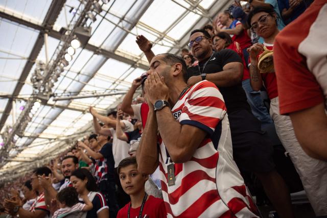 A USA fan reacts during the US national anthem prior to the 2026 World Cup Group D football match between USA and Paraguay at the Los Angeles Stadium in Inglewood, California, on June 12, 2026. (Photo by ETIENNE LAURENT / AFP)