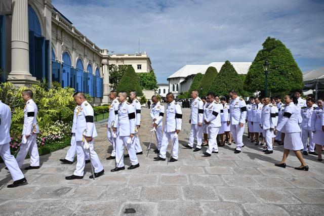 Officials arrive at the Palace to pay their respects following the death of Thai Princess Bajrakitiyabha Mahidol in Bangkok on June 13, 2026. Thai Princess Bajrakitiyabha Mahidol, the king's eldest daughter, has died aged 47, the royal palace announced on June 12, more than three years after she was hospitalised following a sudden illness. (Photo by ANTHONY WALLACE / AFP)