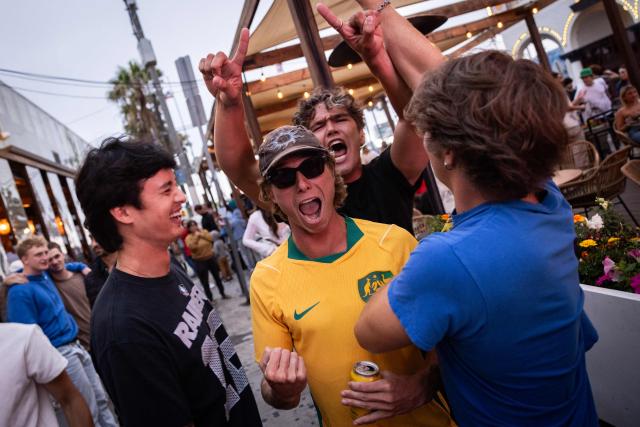 USA fans cheer after their team's victory in the 2026 World Cup football tournament match between USA and Paraguay on the terrace of Belles Beach House in Venice Beach, California, on June 12, 2026. (Photo by ETIENNE LAURENT / AFP)