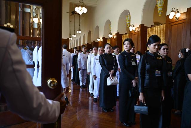 Mourners arrive to pay their respects following the death of Thai Princess Bajrakitiyabha Mahidol at the palace in Bangkok on June 13, 2026. Thai Princess Bajrakitiyabha Mahidol, the king's eldest daughter, has died aged 47, the royal palace announced on June 12, more than three years after she was hospitalised following a sudden illness. (Photo by ANTHONY WALLACE / AFP)
