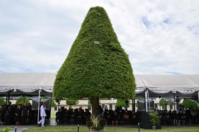 Mourners gather to pay respects to the late Thai Princess Bajrakitiyabha Mahidol on the grounds of the Grand Palace in Bangkok on June 13, 2026. Hundreds of black-clad Thai mourners gathered at the royal palace in Bangkok on June 13, awaiting the arrival of the body of the king's eldest daughter a day after her death was announced. (Photo by ANTHONY WALLACE / AFP)