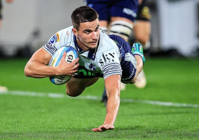 Blues Payton Spencer dives in to score a try during the Super Rugby Pacific semi-final match between the Wellington Hurricanes and Auckland Blues in Wellington on June 13, 2026. (Photo by Grant Down / AFP)