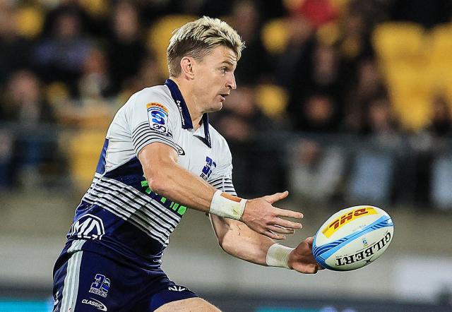 Blues Beauden Barrett grabs the ball during the Super Rugby Pacific semi-final match between the Wellington Hurricanes and Auckland Blues in Wellington on June 13, 2026. (Photo by Grant Down / AFP)
