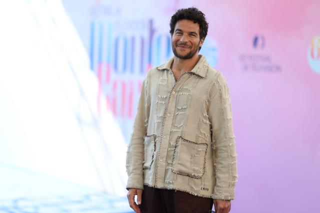 French-Israeli singer and songwriter Amir Haddad poses during a photocall for the TV series "La belle et le boulanger" as part of the 65th Monte-Carlo Television Festival in the principality of Monaco on June 13, 2026. (Photo by Valery HACHE / AFP)