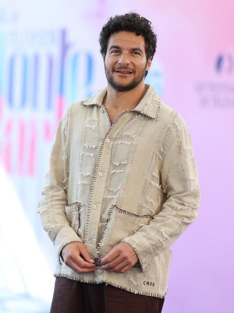 Amir Haddad poses during a photocall for the TV series "La belle et le boulanger" as part of the 65th Monte-Carlo Television Festival in the principality of Monaco on June 13, 2026. (Photo by Valery HACHE / AFP)