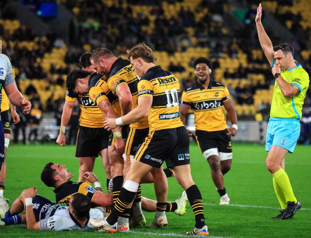 Hurricanes Josh Moorby reacts after scoring a try during the Super Rugby Pacific semi-final match between the Wellington Hurricanes and Auckland Blues in Wellington on June 13, 2026. (Photo by Grant Down / AFP)