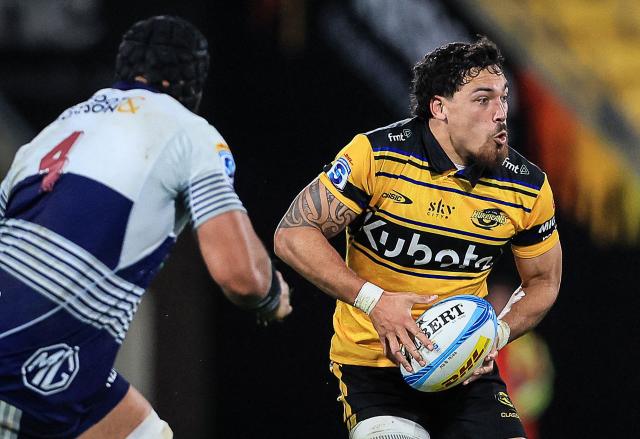 Hurricanes Billy Proctor runs the ball during the Super Rugby Pacific semi-final match between the Wellington Hurricanes and Auckland Blues in Wellington on June 13, 2026. (Photo by Grant Down / AFP)