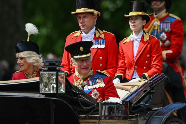 Britain's King Charles III and Britain's Queen Camilla arrive to attend the King's Birthday Parade "Trooping the Colour" in London on June 13, 2026. (Photo by JUSTIN TALLIS / AFP)