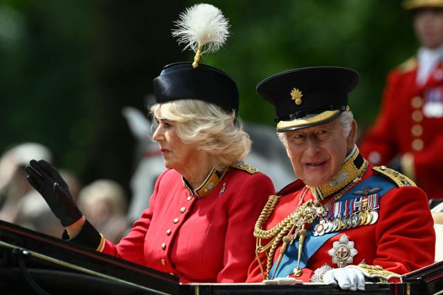Britain's King Charles III and Britain's Queen Camilla arrive to attend the King's Birthday Parade "Trooping the Colour" in London on June 13, 2026. (Photo by JUSTIN TALLIS / AFP)